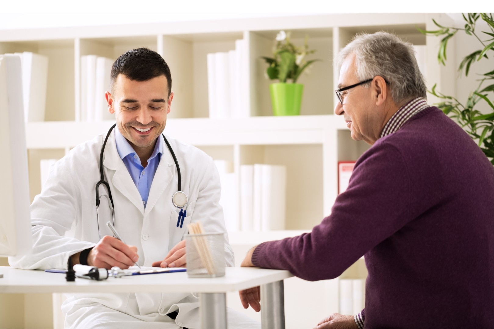Doctor smiling with patient
